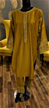 Ready to Wear- 2 Piece -Mustard Color Lawn ,  Embroidery Neck, Sleeves with Pockets .